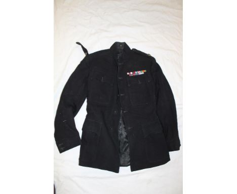 A 1948 dated Major's blue military four pocket tunic formerly the property of Major A. J. M. Parry, Parachute Regiment with m