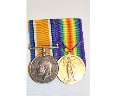 A First War pair of medals awarded to No. 2402 Pte. J. C. Smale DCLI, court mounted