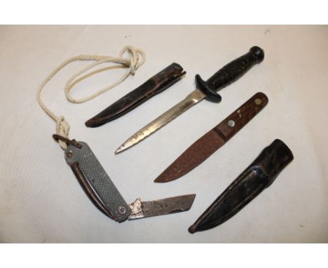 A small hunting knife with wood grips in leather sheath; military jack knife by Rodgers and one other Nimrod Inox knife (3)