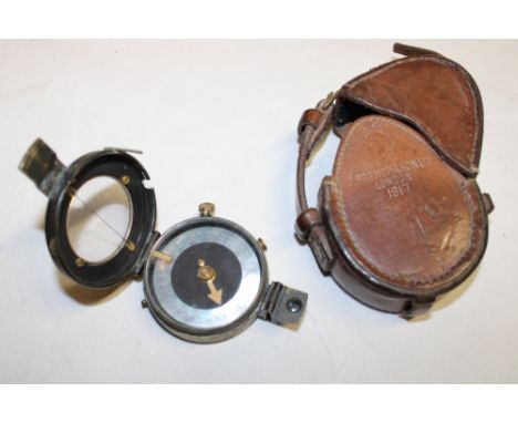 A First War Officer's trench compass dated 1917 in leather case by T French &amp; Son Limited London dated 1917