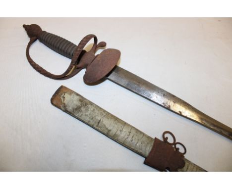 An 18th century small sword, probably Dutch, with 30" etched blade marked "V... VON ORANG", steel guard with wire bound fish 