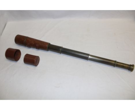 A brass military three-draw spotting telescope by Broadburst Clarkson &amp; Co. Ltd. London with leather covered body