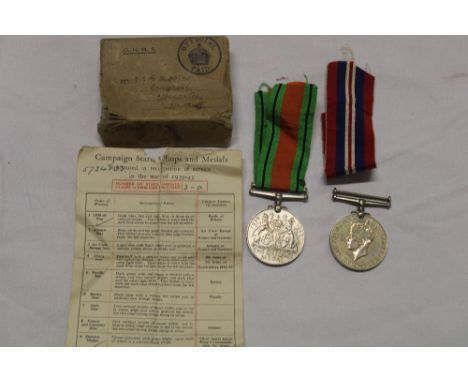 A 1939/45 War medal and Defence medal in box of issue with Army Council slip