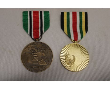 An United Arab Emirates Liberation of Kuwait 1991 medal and a first Gulf War Bahrain Liberation of Kuwait medal (2)