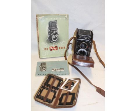 A Rolleicord Franke &amp; Heidecke twin lens reflex camera in leather case together with instruction manual, the Rollei book,