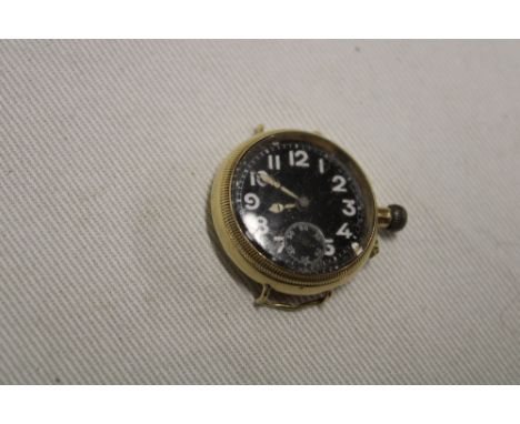 A First War Officer's 18ct gold trench watch with blackened circular dial, movement by A. Shields and engraved initials to th