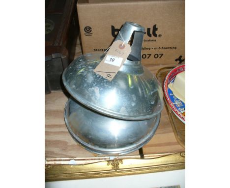 Four metal industrial type hanging light shades.