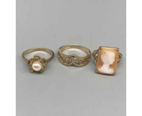 9ct yellow gold ring set with single pearl, size O, a 9ct gold cameo ring, size L, and another 9ct gold ring, size Q, all sta