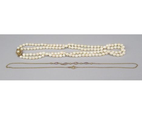Double row pearl necklace, with 9ct yellow gold flower head clasp, L41cm, stamped 9ct, and a 9ct yellow gold necklace set wit