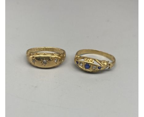 18ct yellow gold gypsy style ring set with three diamonds, size K, and another similar 18ct gold ring set with diamonds and s