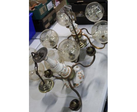Dutch brass and ceramic five branch chandelier and a matching three branch chandelier, both with tint and decorated shades, W