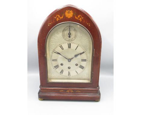 Gustav Becker - early C20th inlaid mahogany lancet cased chiming mantle clock on brass bun feet engraved silvered dial with a