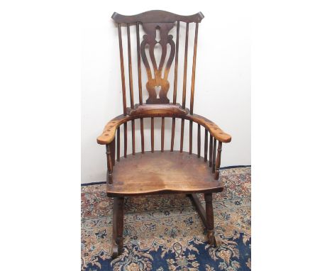 C19th ash and elm high back Windsor rocking chair, stick back with shaped cresting rail and pierced vase shaped splat, shaped