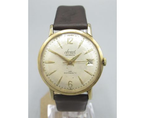 Accurist gold automatic wristwatch with date, signed silvered dial with applied Arabic and baton hours with centre seconds, t