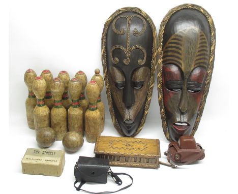 C20th pair of carved African carved and painted tribal masks,  set of bar bowls, mid C20th continental musical jewellery box,