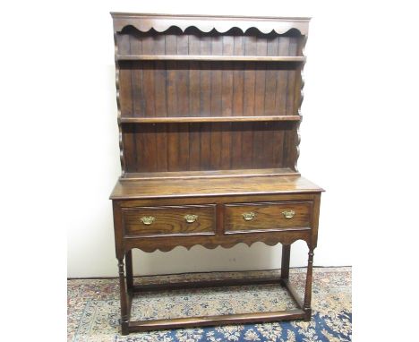 Oak cottage type dresser with two shelf raised back, base with two drawers on turned supports with stretchers, W125cm D47cm H