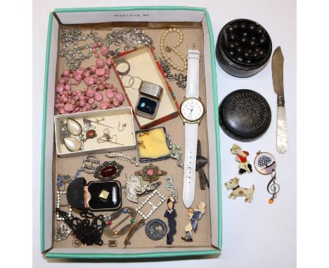 Collection of costume jewellery inc. celluloid brooches, and a silver bladed butter knife with mother of pearl handle 