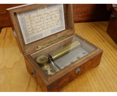 A small late 19/early 20thC walnut cased cylinder musical box by Hermann Thorens, the 3” cylinder playing six airs, including
