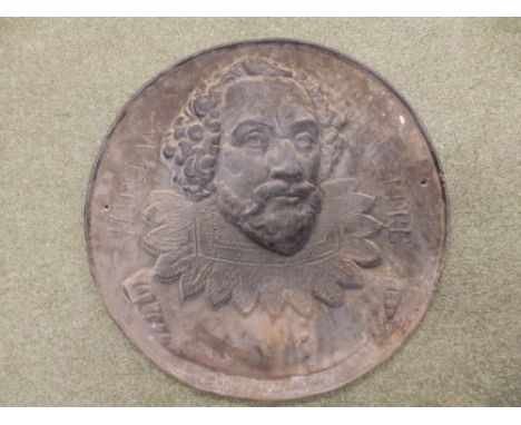 A heavy 19thC cast iron circular portrait plaque commemorating 'William Shakespeare', 21” diameter.