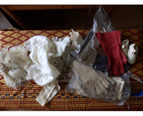 Evening gloves, a scarf, handbags and other items.