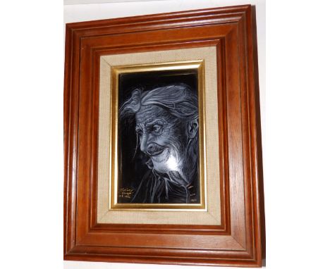 A framed Limoges enamel painted plaque depicting an elderly woman en grisaille, signed & dated 1981, 5.5” x 3.5”.