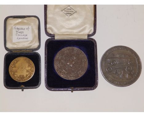 Two boxed medallions – 'City & Guilds of London Institute' and 'Fellowship of King's College London' together with an Austin 