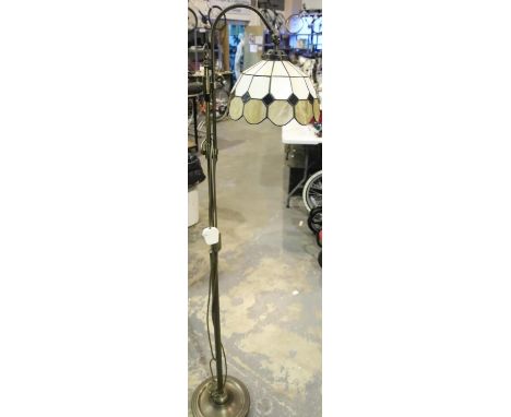 Brass floor lamp with Tiffany style shade. Not available for in-house P&PCondition Report: All electrical items in this lot h