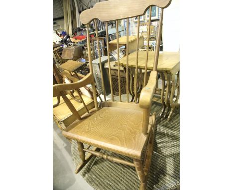 Stained wood stick back rocking chair. Not available for in-house P&amp;P 