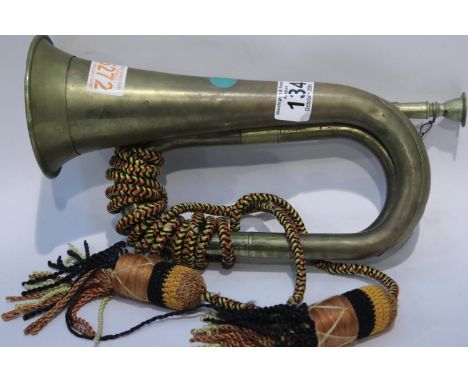 Unnamed military type bugle with rope lanyard. P&amp;P Group 1 (£14+VAT for the first lot and £1+VAT for subsequent lots) 