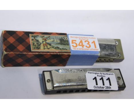 Two vintage harmonicas including a Hohner Echo example. P&amp;P Group 1 (£14+VAT for the first lot and £1+VAT for subsequent 