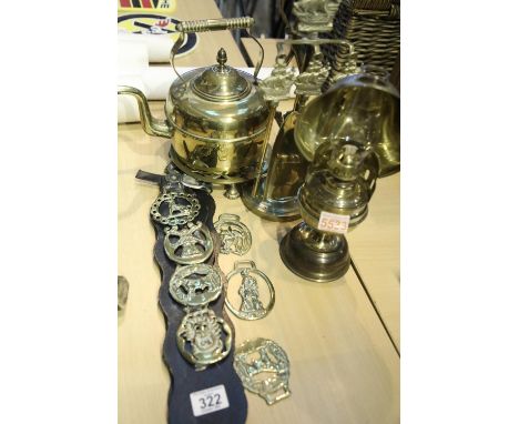 Shelf of mixed brassware including antique style brass lamp with reflector. Not available for in-house P&amp;P 