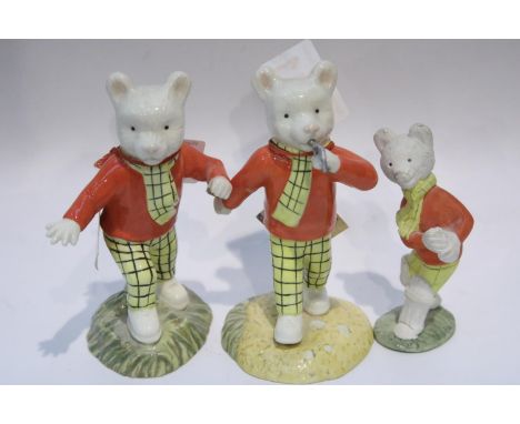 Two Royal Doulton Rupert the Bear figurines and another Rupert figurine. P&amp;P Group 1 (£14+VAT for the first lot and £1+VA