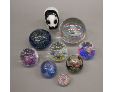 A collection of glass paperweights, Caithness and others.