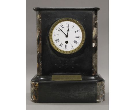 A Victorian marble mantle clock bearing presentation plaque, inscribed ''1889 Q.O.W Hussars Given by The Officers for Smartes