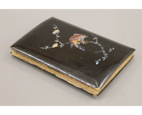 An Edwardian Japanese lacquer and mother-of-pearl postcard album containing various Oriental scenes, including Kalda Station 
