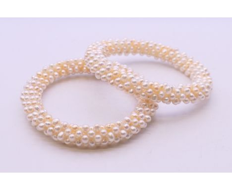 Two seed pearl bangles.  5.5 cm internal diameter.