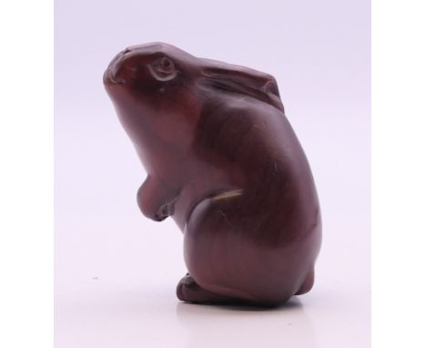 A netsuke formed as a rabbit. 5 cm high.