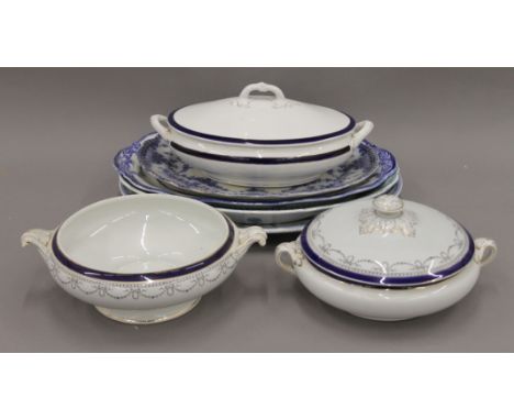 A quantity of blue and white porcelain meat plates and tureens.
