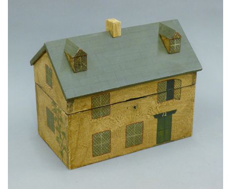 A house formed tea caddy. 26 cm wide. 