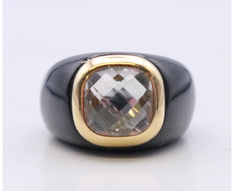 A 14 K gold set ring.  Ring size P.