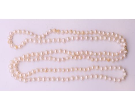 A pearl bead necklace. 126 cm long. 