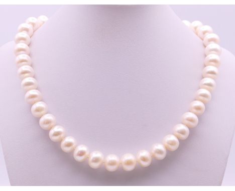 A pearl bead necklace.  44 cm long. 