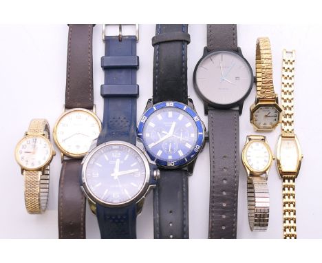 A quantity of various wristwatch, including Guess, Sekonda, Accurist, Citizen and Timex.