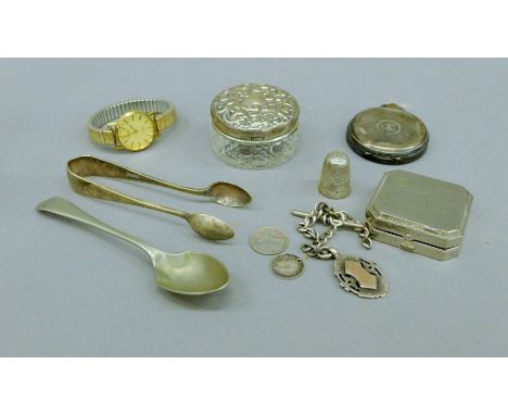 A small quantity of items, including a Coty compact, a silver watch chain and a fob, thimble, sugar tongs, silver lidded glas