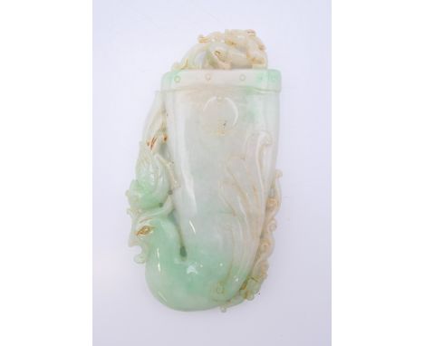 A Chinese light green jade phoenix, Qing Dynasty. 11 cm high.Provenance: The Larkin/Minney Collection. 