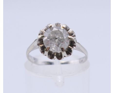 An 18 ct white gold diamond solitaire ring. The claw set stone approximately 1.30 carats. Ring size K/L. 2.7 grammes total we
