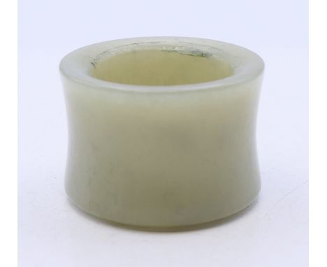 A shaped celadon jade archer's ring. 2.5 cm high.