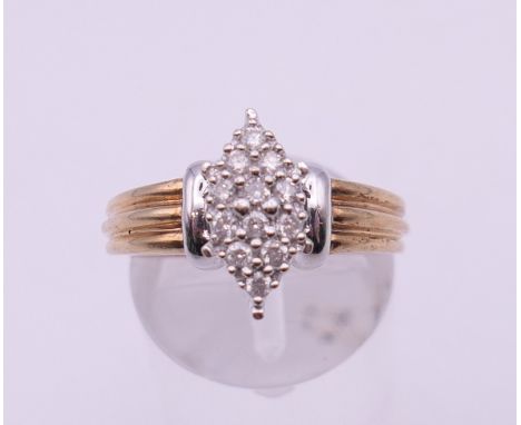 A 9 K gold 0.25 carat diamond cluster ring. Ring size N. 5.7 grammes total weight.