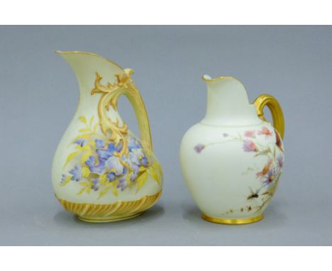 Two Royal Worcester jugs. The largest 16 cm high.