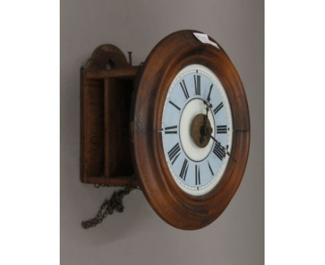 A Victorian postman's alarm clock with blue dial. 28 cm diameter.